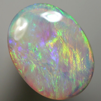 SOLID SEMI BLACK OPAL Orange moves with green with a touch of purple between these colours